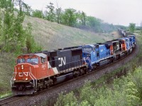 CN train 334 was definitely one of the more interesting trains back in this time period. NS and former Conrail units showed up often on both 334/335. Unfortunately the routing of this traffic was later changed to Montreal instead of Toronto and the Niagara region lost yet another train. This day the trio of LMS Dash-8 was kind of interesting and considering the time period it was possible they were in transit to CN as part of its split lease of part of the fleet. When CSX and NS split up Conrail, the split leased LMS units were finally divided three ways between CN, NS and CSX. Later all of the railroads would either fully repaint, or patch the ex LMS fleet. 