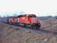 <br>
<br>
The Rouge Valley and unique place names: Staines, Cherrywood, Locust Hill, CN Beare, and of course Plug Hat Road and Twyn Rivers Drive,
<br>
<br>
Here a pair of SD's have #916 on the move and on the CN York Sub overpass and about to cross Beare Road on the approach to Cherrywood.
<br>
<br>
And do note the treeless CN York right-of-way. 
<br>
<br>
Near mile 191 Belleville Sub-Division with new SD40-2 CP Rail 6014, April 19, 1981 Kodachrome by S. Danko.
<br>
<br>
