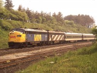 I was very intrigued by the unveiling of the "new" VIA 6539 at Salford, Ontario. (Thank you, Mr. Host) and got to wondering if I had ever seen this unit back in the day. Did manage to come up with this image from summer 1978, showing VIA 6539 leading 6623 coming eastbound off the Dundas hill toward Bayview. Shots in the afternoon are generally ruined by the harsh sun angles, but today, due to a lot of haze, this shot isn't all that bad.