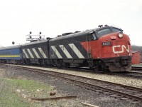 Luck of the draw, I suppose, but I rarely saw this particular while out photographing. The CN 6521 became 6308 in the rebuild program of 1983-85 and ended up with the Georgia Southwestern.
It is a rather grubby looking morning out here at Bayview Jct watching this westbound roll by. The "B" unit looks to be 6630, can't quite make it out.