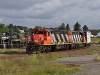 The Sudbury Turn heads out of Capreol on August 21, 2009 behind a pair of GP38-2s: 4710 and 4717.