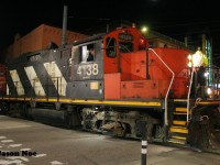 My connection to CN 4138 goes back over 30 years. In July 1993, I had my first cab ride in the GP9RM on the Waterloo Spur, which at the time still had a CN logo on its nose.
<br>
Two years after that, it famously had its logo/CN noodle removed and AR Illinois lettering was applied for its role in the Canadian movie “The Wrong Guy,” which was filmed around Toronto and was featured in the train scenes.
<br>
In the three decades since my ride, 4138 still occasionally can be found heading to Elmira on the spur, now on Kitchener-based CN L566. Both the GP9RM and the line itself have survived the test of time, however the world around the tracks in Waterloo has been transformed. The downtown core and the former Waterloo Town Square Mall have been altered with the addition of the ION Light Rail network. As well, infrastructure along the spur from King Street to the Northfield Drive area of the city has been modernized to accommodate the light transit corridor. With this addition also came an operational agreement where freight trains could now only operate over this portion of the spur to Elmira between 23:00-05:00 due to the LRT schedule. 
<br>
However, there is no better example of time, then on 4138 itself. As the veteran GP9RM emerges through the buildings and onto King Street, it’s fading, and battle-scarred AR Illinois logo is evidence enough. Here, the conductor has just finished protecting the crossing while onlookers and casual bystanders bring out their smartphones to capture it with photos or vids. And just for that moment, 4138 is a star again. 
If someone had told me when I was a teenager that 30 years later, I would still be photographing the same unit on my hometown line, I don’t know if I would have believed them. This likely won’t be the case moving forward as the remaining aging CN GP9RM fleet are in the twilight of their storied careers.
<br> 
For my 1000th post on rp.ca I’ll cross the tracks and step back in time to the summer of 1996 where myself and 4138 were both much younger. 
