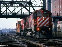 Their transfer complete 4734 heads east to Agincourt yard under the long gone Weston road bridge