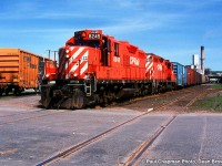 CP GP9u 8245 and CP GP9u 8210 arrive from Sudbury to switch the pulp Mill in Espanola on the Little Current Spur.