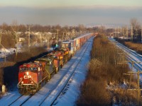 Sunset is about fourty minutes away as an amply powered CPKC 133 heads west through Pointe-Claire. Units are CP 8053, CP 6644, CP 9350, KCS 4840 & KCS 4172.