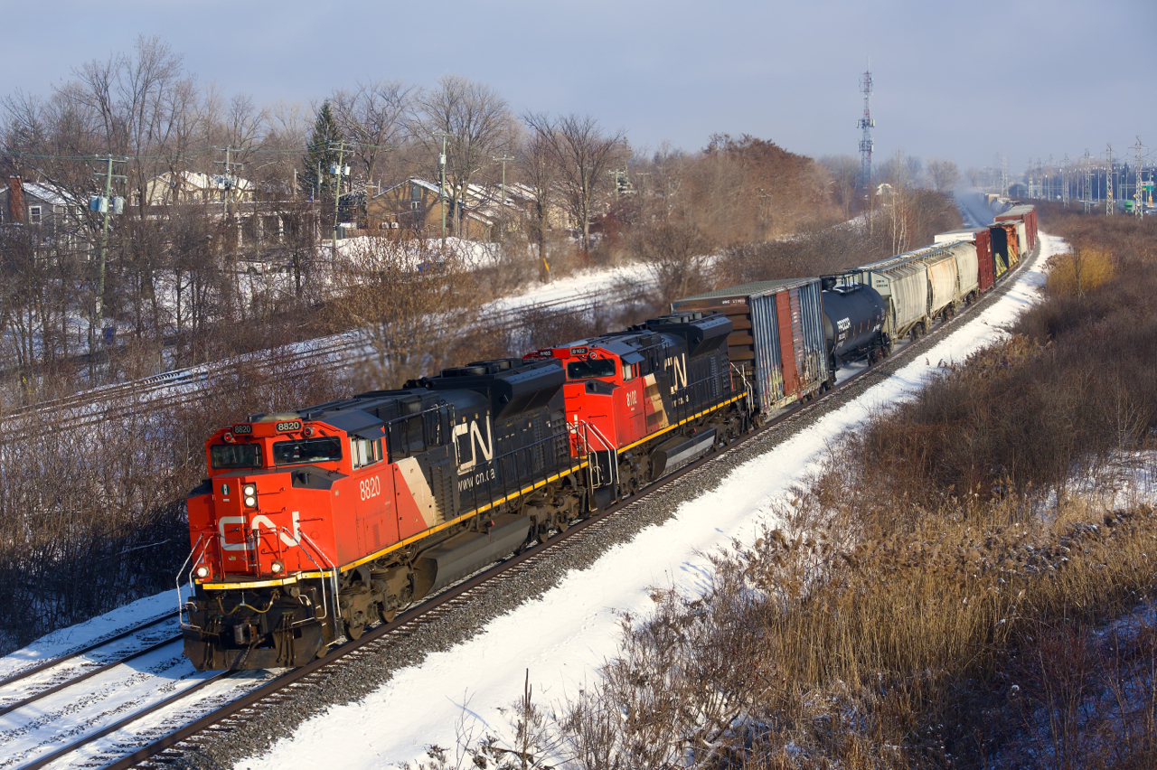 CN 369 rounds a curve with an SD70M-2 and an SD70ACe for power.