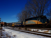 Leaving Central Station late and further delayed by CN 322, VIA 63 in Montreal last Friday morning has a mixed consist as it prepares to cross the Lachine Canal for the second time. VIA 6433 brings up the tail end.