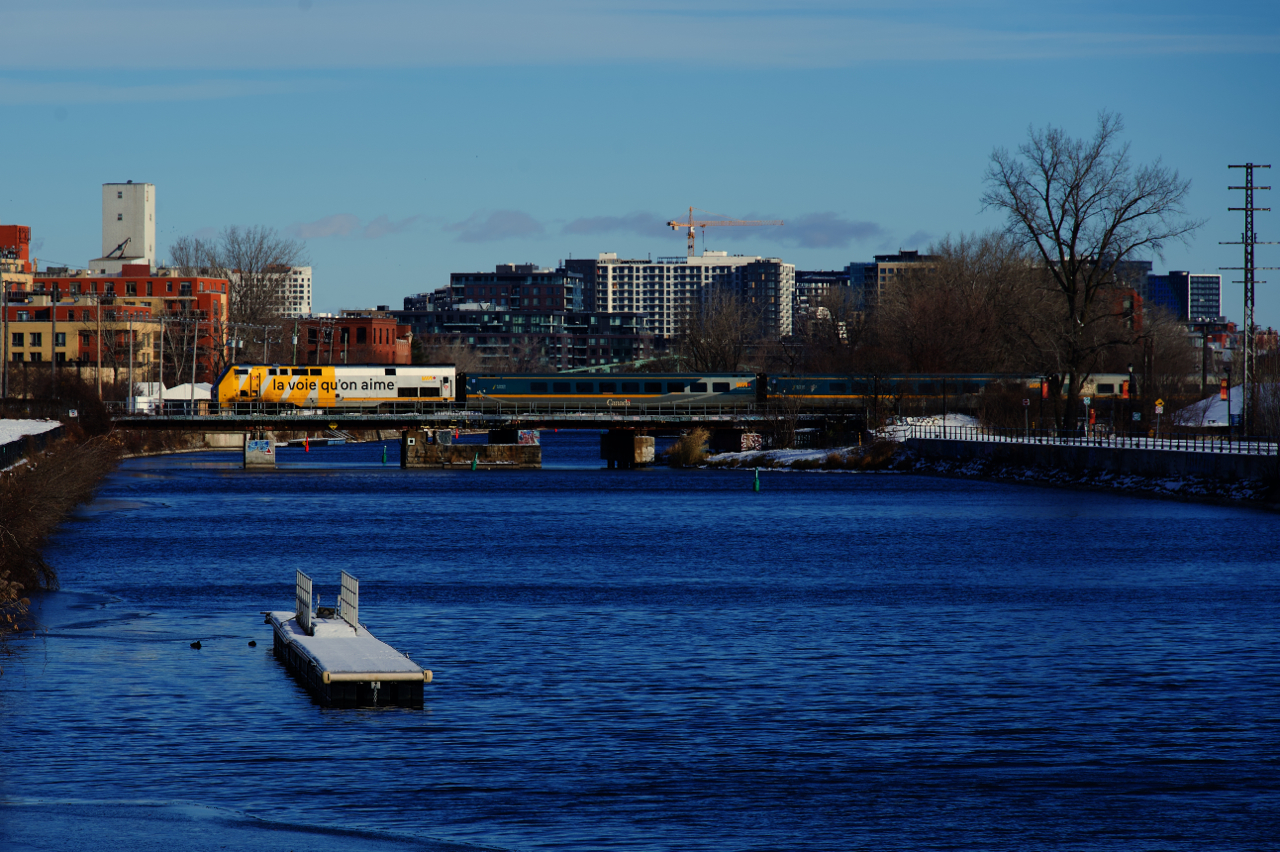 After swapping consists at Central Station, VIA 33 is running quite late as it crosses the Lachine Canal, now with an LRC consist instead of a Siemens one.