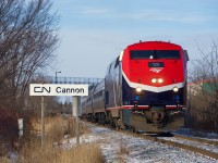 Repainted just this past June, AMTK 125 looks sharp as it passes CN Cannon. This portion of the CN Rouses Point Sub was an interurban line (the Montreal and Southern Counties) way back when.