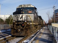 Usually entering Montreal around sunrise or earlier, a late CN 529 passes through St-Lambert Station with a getting rarer Dash9 leader (NS 9878).