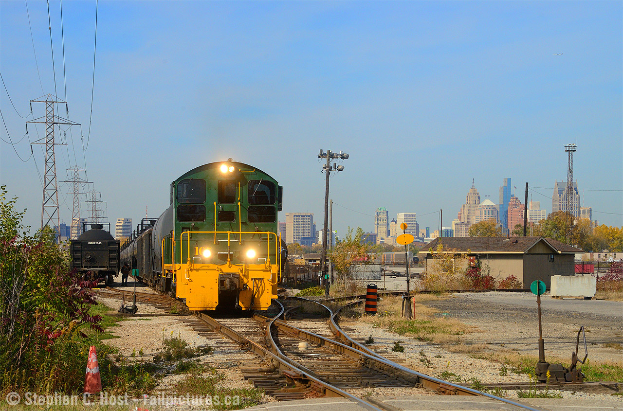 ETL 105 was built in 3/1956 by GMDD London for the Essex Terminal and basically has worked its entire career here. Pictured working the CPKC/ETR Interchange with the iconic Detroit skyline in the background, the 0930 with 105 solo is busy working the interchange before they basically finish for the day in the mid afternoon. You can see a track that leads to the CPKC yard and in the far distance a couple CP locomotives.
The skyscrapers found from right to left, Book Tower,  Penobscot Building, 150 West Jefferson, the 2024 completed "Hudsons" Building in a dark colour, one of the tallest, and the Guardian Building in red. I've spent some time in Detroit over the last couple years and to say the "D" is getting better is an understatement. It still has it's rough spots but it's improving and fast. The Michigan Central station is getting a $1B makeover courtesy of Ford Motor Company who I believe plan to make it an office space. There are plans to bring passenger trains to that Station again, nd as well, cross one train over the border onto the Essex Terminal to VIA Windsor (Walkerville) station by 2026. I'll believe that when it happens. But GO Detroit (and Windsor!) Go. The Gordie Howe bridge will be a crown jewel.