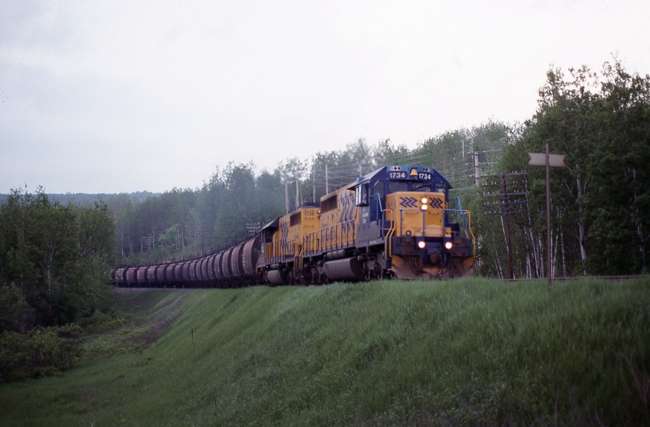 Empty Dofasco ore train NB back to Adams Mine