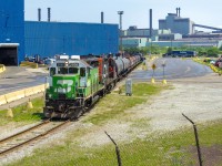 The 0700 Hamilton Job departs Stelco on a toasty Thursday as they make their way back to CN Stuart yard. 2926 has gotten into a collision with a truck at Wentworth the day after this shot, making the unit still unserviceable as of now.
