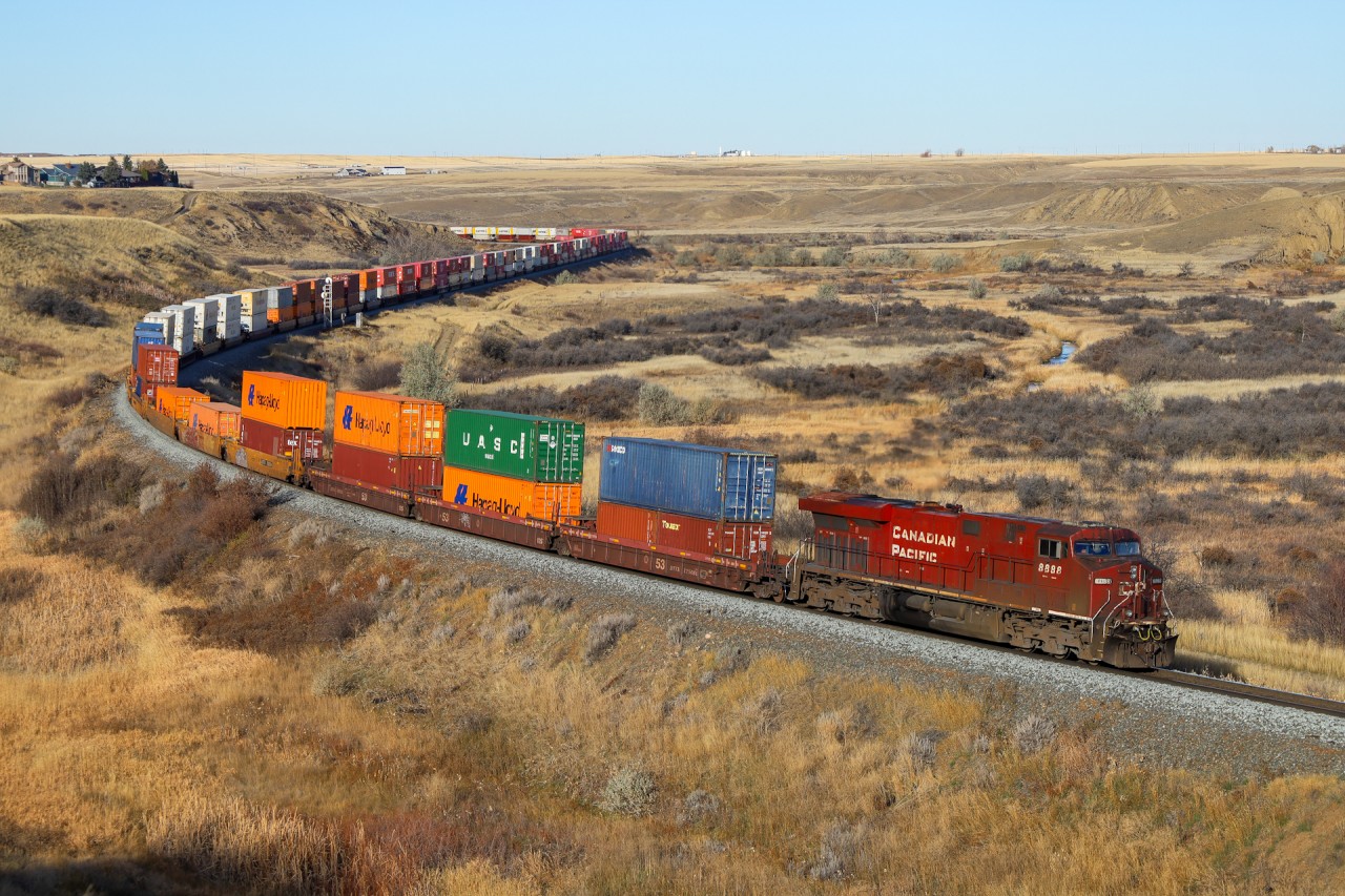 CPKC 100 grinds upgrade out of Medicine Hat with CP 8888 leading.