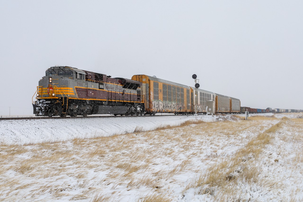 With the snow flying on the prairies, I wasn’t planning on getting out trackside - but how could I say no, after hearing 7014 west calling a signal departing Medicine Hat.