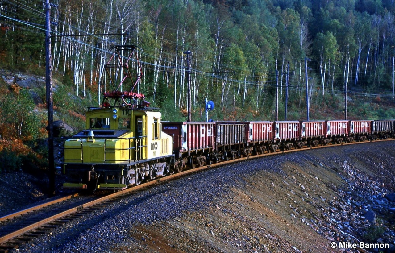 Inco 110 heading back to the mine at Onaping/Levack for reload.
Diesels now run this line the electric operations ending in the mid 1980's