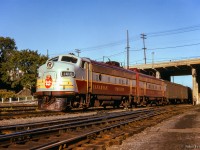 During a stop over in Ottawa after the overnight Toronto - Ottawa leg of the massive <a href=https://www.railpictures.ca/?attachment_id=55181>692.2 mile trip behind CNR 6167,</a> CPR no. 8, <i>"The Dominion,"</i> is seen at Ottawa Union Station alongside the Rideau Canal.  Shortly before this, the pair of GMD FP9As were seen crossing the <a href=https://www.railpictures.ca/?attachment_id=54615>Ottawa River</a> with no. 8 in tow.

<br><br><i>SCan and editing by Jacob Patterson.</i>