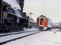 The Upper Canada Railway Society's <i>Barrie Winter Carnival Special</i> pauses at Bradford to meet trains 674 (North Bay - Toronto), and 673 (Toronto - North Bay).  D112 is the RDC assigned to 674 today, pausing for orders alongside 6218.

<br><br><i>Scan and editing by Jacob Patterson.</i>