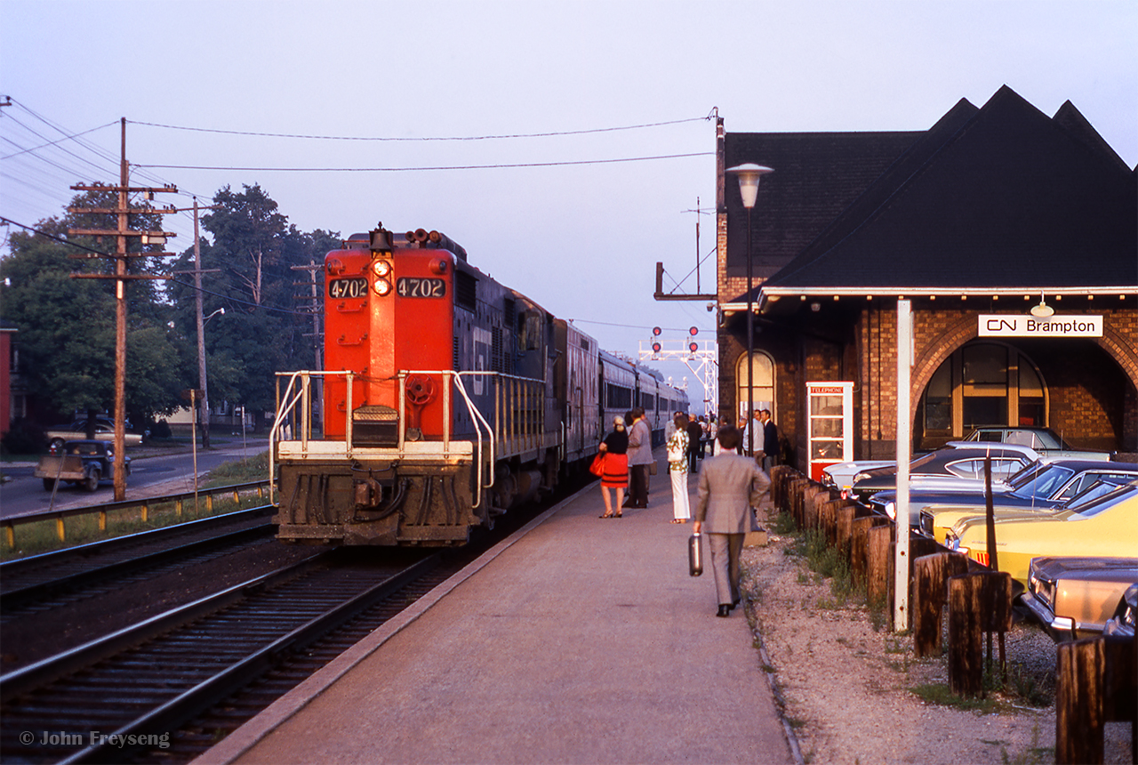 Monday - Friday train 986 from Guelph pulls into Brampton behind GTW GP18 4702 on a hazy late summer morning.

Scan and editing by Jacob Patterson.