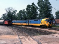 The Northlander passing CN freight southbound at Washago Station