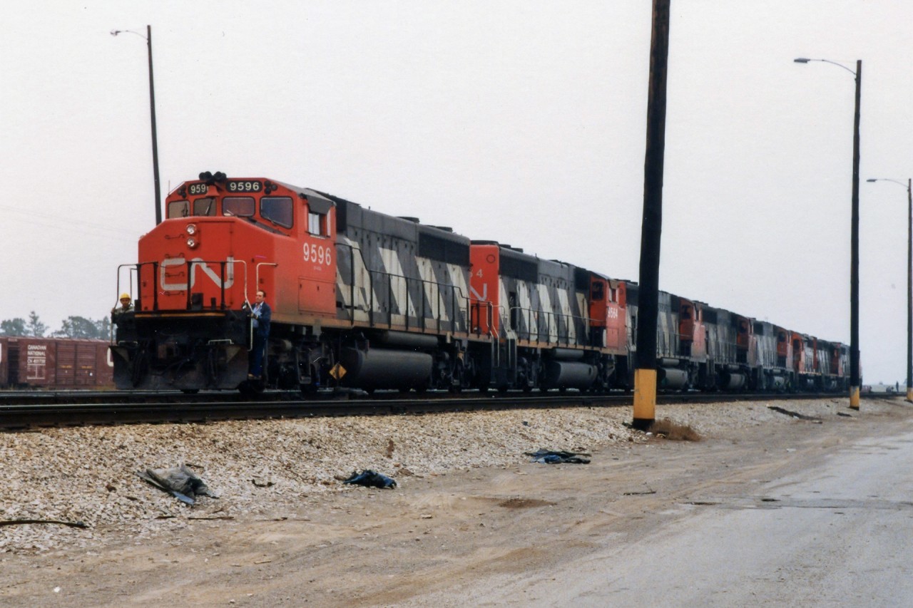 No less than 8 units for 471 on this day. The 5 GP40-2's will be power for tomorrow's Ore Train; 730. The lead SD40-2 and 2 GP40's will bring 470 back to Toronto tomorrow. If I'd thought about it, the GP40's will probably be leading, but I wasn't thinking that far ahead in those days.