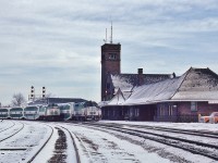 <br>
<br>
What ever happened to …...
<br>
<br>
…........GO Brantford........
<br>
<br>
GO equipment subbing for the tardy delivery of the new, fang-dangled, tilting coach LRC's  - ordered 1978 (delivered 1981 + ).
<br>
<br>
GO #500 is the trailing unit on the eastbound GO #506; as GO #514 leads a westbound to the station stop,
<br>
<br>
At CN Brantford, December 28, 1980 Kodachrome by S.Danko
<br>
<br>

