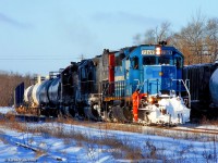 Looking back 10 years, GEXR 432's conductor rides the point as they prepare to drop their train and lift a dimensional load out of XW32.  A cut of buffer cars can be seen at right with the load from <a href=https://www.railpictures.ca/?attachment_id=12106>Innovative Steam Technologies</a> bringing up the rear.  Within 15 minutes they'll be underway again with their short train for Mac Yard.