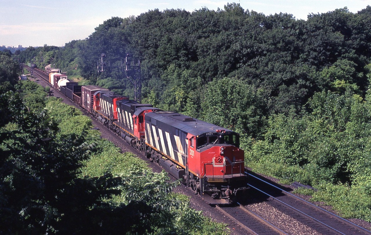 CN HR616 and MLW sisters leading an eastbound thru Bayview Jct