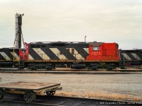 A number of CN units sit outside the diesel shop at Fort Erie, with GP9 4272 front and center.  SD40-2W 5351 and GP40 9302 are also visible, with GP9s 4528, 4276, and SD40-2Ws 5358, 5362 out of frame.

<br><br><i>Bill Grandin Photo, Jacob Patterson Collection Negative.</i>