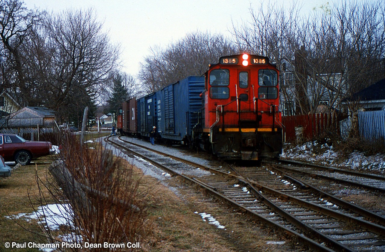 CN 550 with CN SW1200RS 1385 approaching Ontario St. in St. Catharines to serve the GM plant.