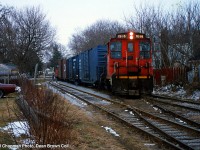 CN 550 with CN SW1200RS 1385 approaching Ontario St. in St. Catharines to serve the GM plant.