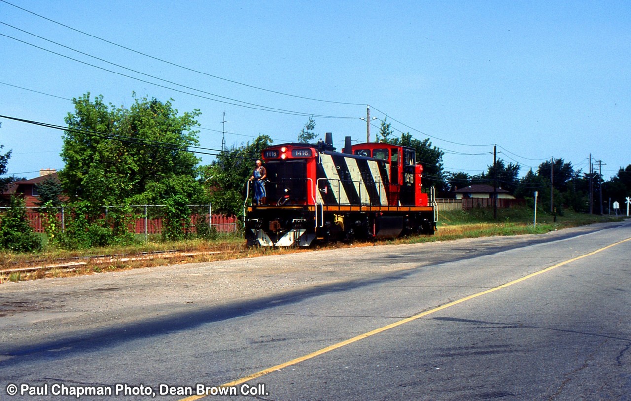 CN 550 with CN GMD1u 1416 at Port Weller West along Niagara St. in St. Catharines.