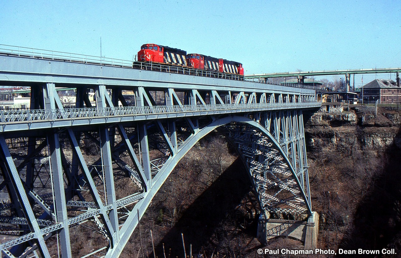 CN SD40-2(W) 5348, CN GP40-2(W) 9633 annd CN GP40-2(W) ??? light power move over the Whirlpool Bridge.