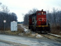 CN 550 with CN SW1200RM 7101 heads northbound at Merrittville Hwy on the CN Fonthill Spur after serving the Fonthill Lumber. 