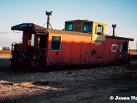 CN International caboose 78105 gets too see at least one more sunset as it awaits its eventual fate at CN’s S Yard in Vaughan, Ontario. Situated beside the Highway #7 overpass the stub-ended tracks were a portion of CN’s MacMillan Yard and used for the storage of older and retired cars, which eventually were scrapped on site. 