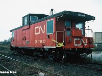 CN caboose 79817 shows obvious signs of damage as it sits at Burlington West, Ontario on the CN Oakville Subdivision. One wonders if it was ever repaired or was just taken to MacMillan Yard and eventually scrapped. 