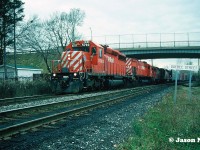 During a November morning an eastbound CP train is viewed departing the Quebec Street Yard in London, Ontario.  The consist included; SD40-2 5793, M-636 4723, GP9u 8207 and SD40-2 5482. High-hood 5482 was ex-NS 3252 and nee-Southern Railroad 3252. 