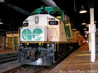 GO Transit F59PH 521 has just arrived at Toronto's Union Station on Track 1 (platform 3) off late morning train #254 from Bramalea (departing 10:15am, arriving at Union 10:48am), and is waiting for its final passengers to disembark before laying over and switching ends to cab car 226 for the trip back out on #257 at 11:30am (working the afternoon "Bramalea Flip" runs).<br><br>The Track 1 spot under the train shed here was always good for a photo while heading to/from the bus terminal or GO concourse, and also allowed one to check the builder's plate of every F59 that still had one - 521's check on this day showed serial A-4746, class GCE-430G, build date 8-88, manufactured at GMDD London, Canada.