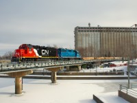 New to the CN roster, CN 4951 leads CN 500 into the Port of Montreal. After a number of very cold and snowy days, the Lachine Canal is frozen solid.