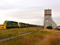 The new paint jobs on these two Great Sandhills units really make them stand out. I trust more will be done. The scene is late in the afternoon and this westbound has just finished putting its' train together at Pennant and is heading toward home base at Leader. We are just west of the Pennant as the grain elevator is actually in a hamlet referred to as Battrum. Anyway, nice countryside on a very pleasant day.  Power is GSR 2022, 2009 and HLCX 3839.