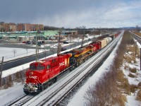 CPKC/KCS/CP paint schemes are up front on CPKC 231 as it flies through Pointe-Claire with CP 9375, KCS 4685 & CP 2240 for power. CP 2240 will be dropped off at Smiths Falls.