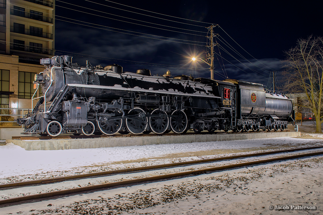 In response to Eric May's 2006 image, here is a recent view of CNR 6167 on display in downtown Guelph.  Illuminated by overhead lighting, work by Guelph Museums volunteers can be seen, including the CNR herald on the tender, and new cab windows.