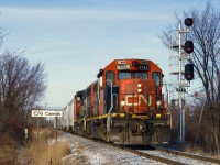 CN 4724 & CN 9413 is the power on CN 522 as it heads south on the Rouses Point Sub, on its way to a grain client in Saint-Jean-sur-Richelieu with fourteen hoppers