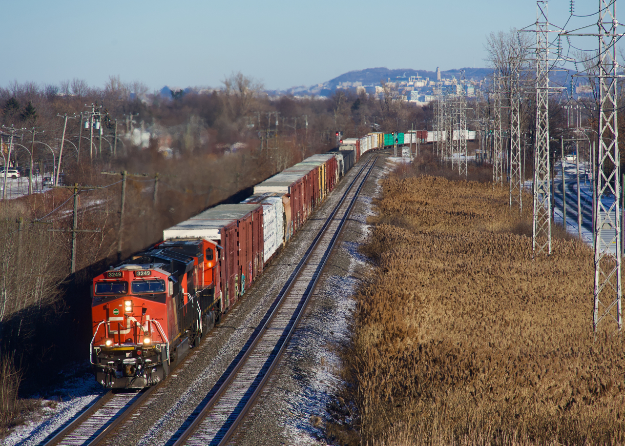 Mount Royal is in the background as CN 369 rounds a curve.