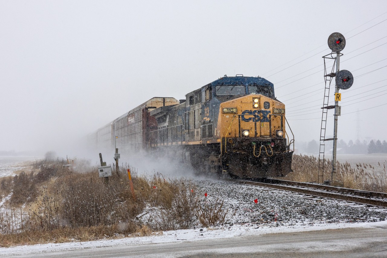 After looking at the weather and noticing that some afternoon snow would be forecasted, I had planned to get CN 438 with 2510 leading in hopes to see it was some half-decent snow. But, after checking my phone mid day, I had found out that there was a CSX YN2 leading a 2-H89 by Denfeld. Well, in hopes of not getting screwed over by light, I decided to go out as far east as I could go, and made it here to WSS Tilbury. The longer I waited, the more the snow was piling up, making for an amazing snow show for the CSX to go through! I also managed to get 438 as well in even more snow too! But that will be another photo for later...