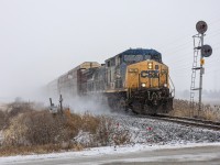 After looking at the weather and noticing that some afternoon snow would be forecasted, I had planned to get CN 438 with 2510 leading in hopes to see it was some half-decent snow. But, after checking my phone mid day, I had found out that there was a CSX YN2 leading a 2-H89 by Denfeld. Well, in hopes of not getting screwed over by light, I decided to go out as far east as I could go, and made it here to WSS Tilbury. The longer I waited, the more the snow was piling up, making for an amazing snow show for the CSX to go through! I also managed to get 438 as well in even more snow too! But that will be another photo for later...