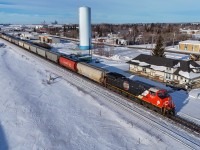 G 80852 07 rolls past the beautifully restored station at Viking, Alberta with CN 3331 leading. 