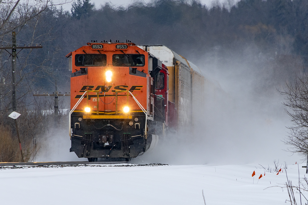 BNSF leading on the Galt? Sure, it happens once in a while. BNSF GM leading on the Galt? I'm not missing that. Looking like mother and child elephants, tiny 2254 trails offering encouragement. 137 would drop 2254 at Wolvweron and replace it with UP 7050 for the run to Chicago.