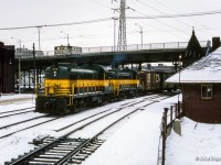 Train 452 from North Bay to Toronto curves past Don station as it enters the Toronto Terminals Railway trackage behind a pair of ONR RS3s.  <b><br><i>Scan and editing by Jacob Patterson.</i>