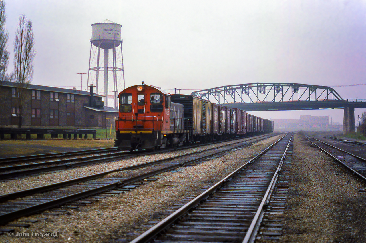 CN 7025 leads a string of boxcars on transfer to Buffalo towards the International Bridge.

Scan and editing by Jacob Patterson.